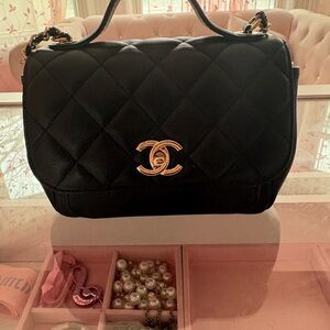 Black Quilted Top-Handle Shoulder Bag with Gold Hardware
